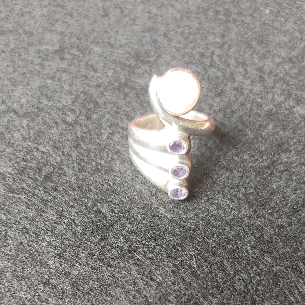 Mother of Pearl and Three Purple Stones